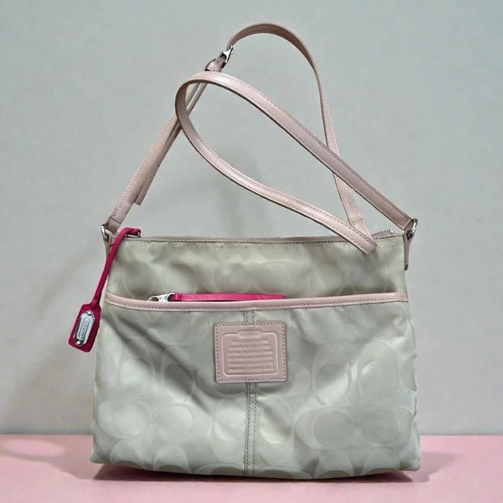 Coach Legacy Weekend Signature Nylon Hippie bag